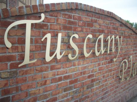 Tuscany Apartments Sign